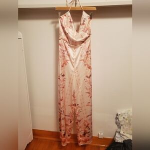 NWOT Guess floral satin jumpsuit. Faux wrap. Tie around neck. Wide leg. Size S.